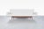 Mid-century modern walnut sofa designed by Jens Risom for Risom Designs, United States, circa 1950s. Model U-150 is a...