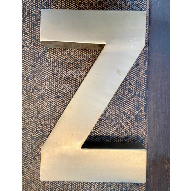 Vintage metal gold color finish store sign reclaimed letter z.