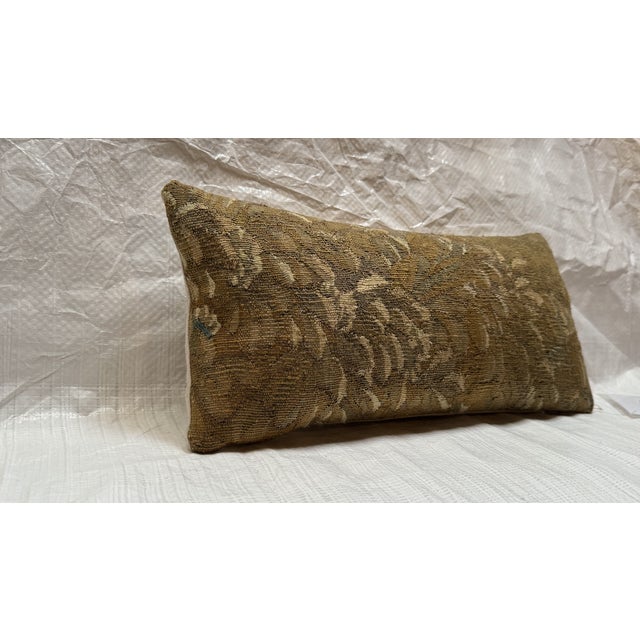 Made from a genuine fragment of a 17th century Brussels tapestry, this antique pillow reflects the extraordinary...