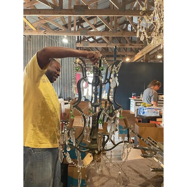 French Iron and Crystal Chandelier – 1940s Vintage Fixture Add timeless elegance to your space with this vintage French...