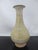 Antique Chinese celadon glazed vase with bulbous body and tapered neck. Measures 10 1/4" tall x 5" Sizable chip at rim, as...