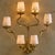 An Italian gilt leaf wall sconce from the 1960s, where craftsmanship meets the natural grace of botanical form. Rising...