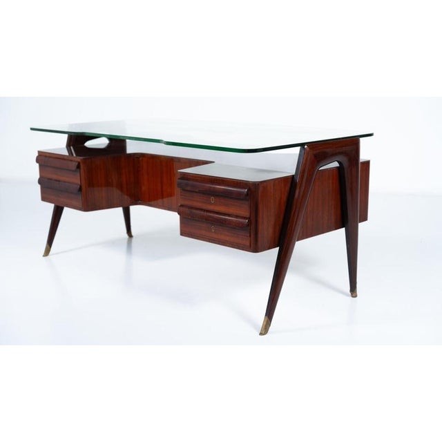 Mid-Century Modern Vittorio Dassi Desk, Wood and Glass, 1950s This piece is attributed to the mentioned designer/maker. It...