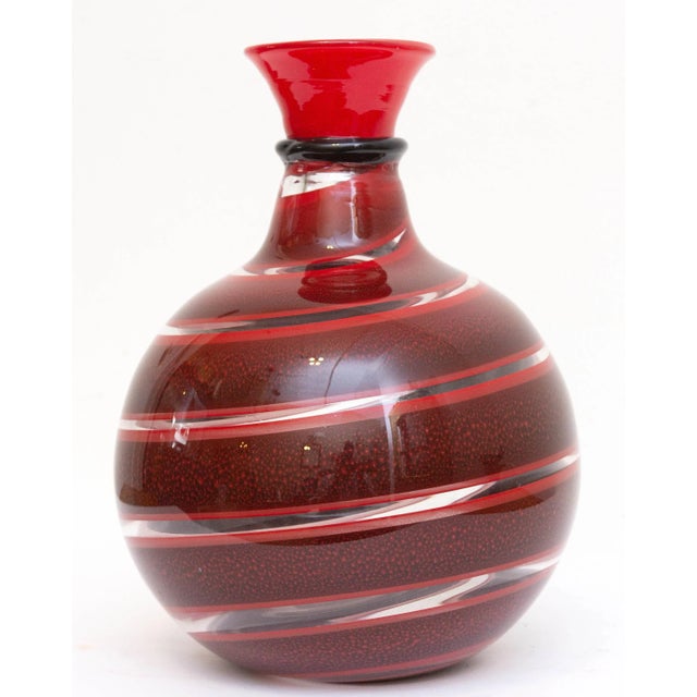 Murano garnet red and clear swirl vase. Hand blown with ground pontil. Venetian. Circa 1980s.