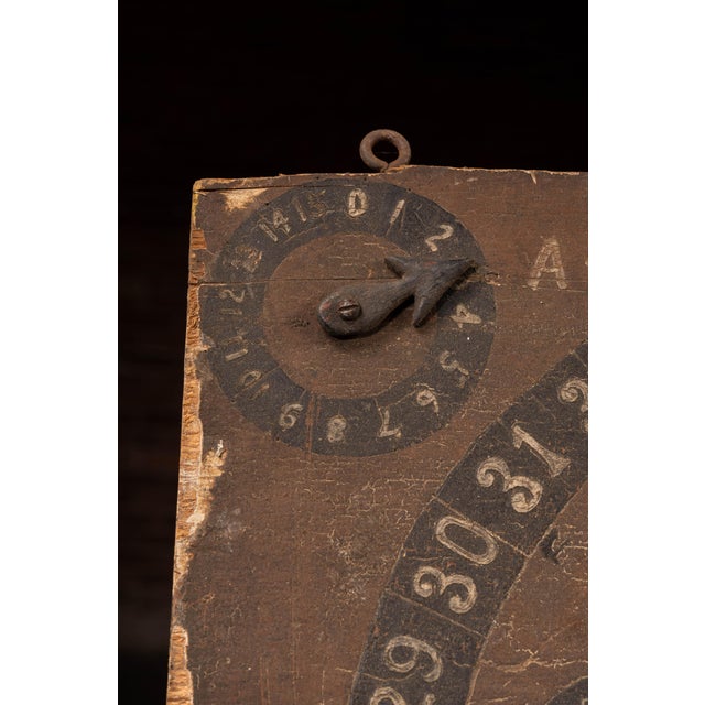 Ornate, large-format wooden scoring board designed for parlor card games in the Bezique family, featuring dual mirrored...
