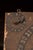 Ornate, large-format wooden scoring board designed for parlor card games in the Bezique family, featuring dual mirrored...