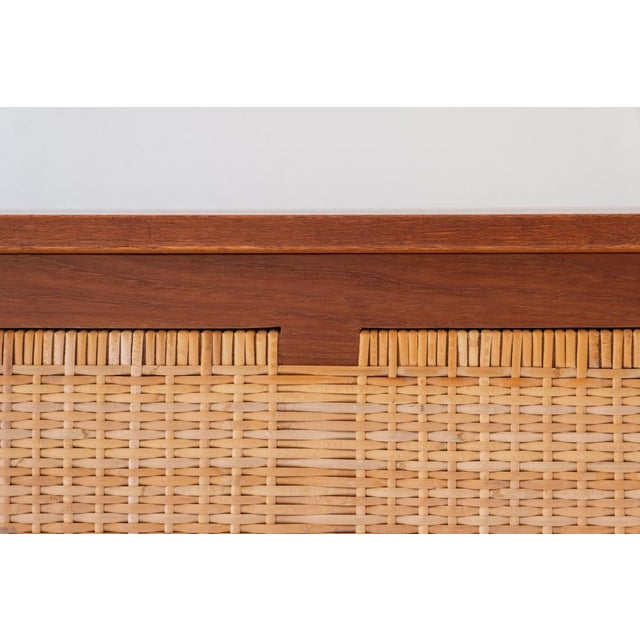 Rare chest in teak by Kai Winding for Poul Hundevad, Denmark 1960’s. This (blanket) chest is made out of woven cane and...