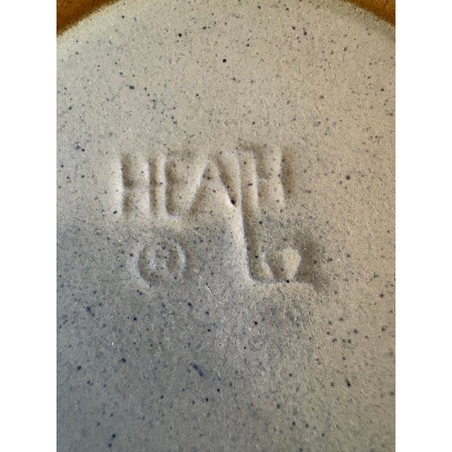 A classic mid-century modern ashtray or cache pot by Heath Ceramics, showcasing the timeless craftsmanship of Edith Heath....