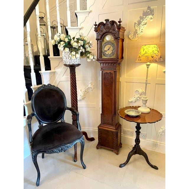 Outstanding quality antique chippendale style carved mahogany grandmother clock with the case being a quality and...