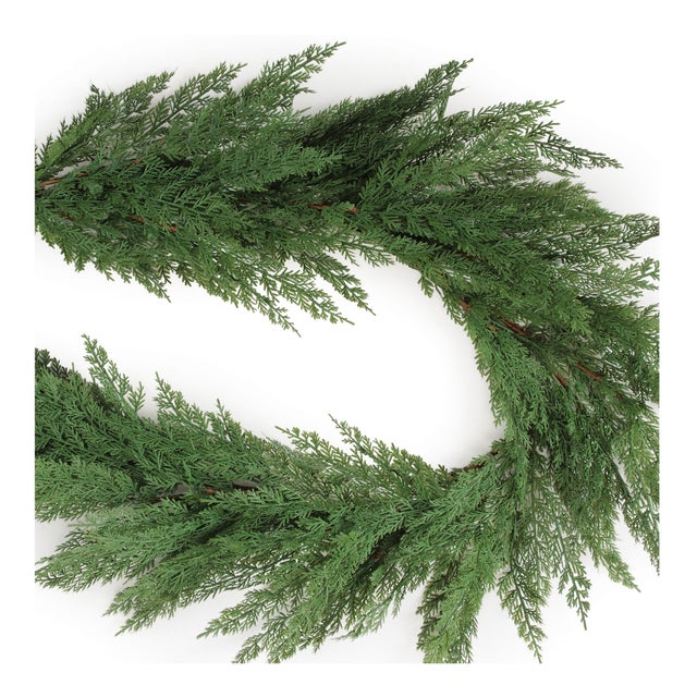 Add fresh, festive greenery to your holiday décor with this Classic Green Pine Garland. Measuring 5.5 feet long, this lush...