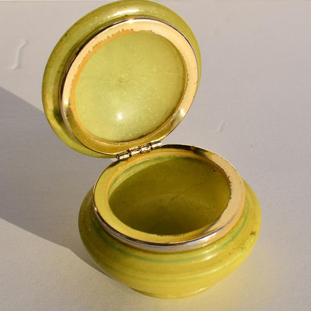 A beautiful mid century circular round green Italian alabaster hinged trinket box. A soft honed stone storage jar with a...