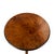 This striking antique occasional table with an exceptionally beautiful figured burl wood top and an elaborately turned...