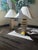 These lamps with their original coolie shades hail from High Point, North Carolina. They are in the style of Van Teal...