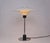Vintage table lamp PH4/3 produced by Louis Poulsen Denmark. The lamp is designed by Poul Henningsen. The lamp has a white...