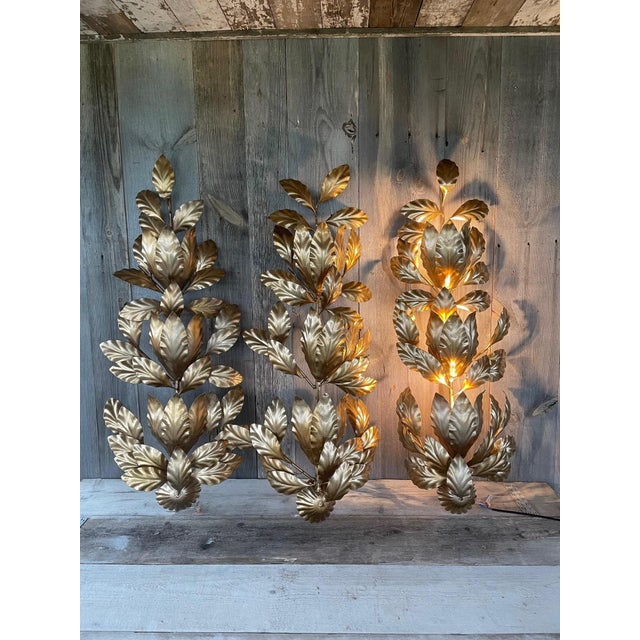 Florentine Hollywood Regency Wall Lights, Set of 3, in Good conditions. Designed 1970 to 1979 European Plug (up to...