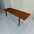 Elegant Danish Mid-Century Modern coffee table dating from the 1960s. Featuring a clean rectangular tabletop, gently...