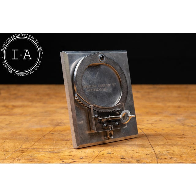 c. 1960s-1970s; American Handcuff Co. - Rockford, IL Mounted cutaway demonstration model illustrating the internal ratchet...