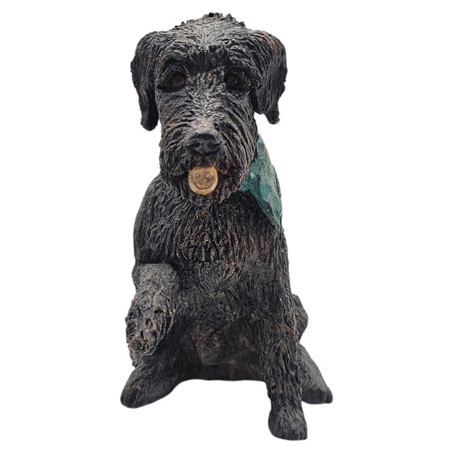 A hand-built terracotta sculpture depicting a Spinone Italiano hunting dog, modeled with pronounced wire-hair texture and...