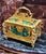 Elegant French style jewelry box crafted in rich green porcelain with luxurious gilt bronze ormolu accents. This...