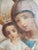 Impressive antique Eastern Orthodox icon depicting the crowned Madonna and Child with attendant angels, hand-painted on a...
