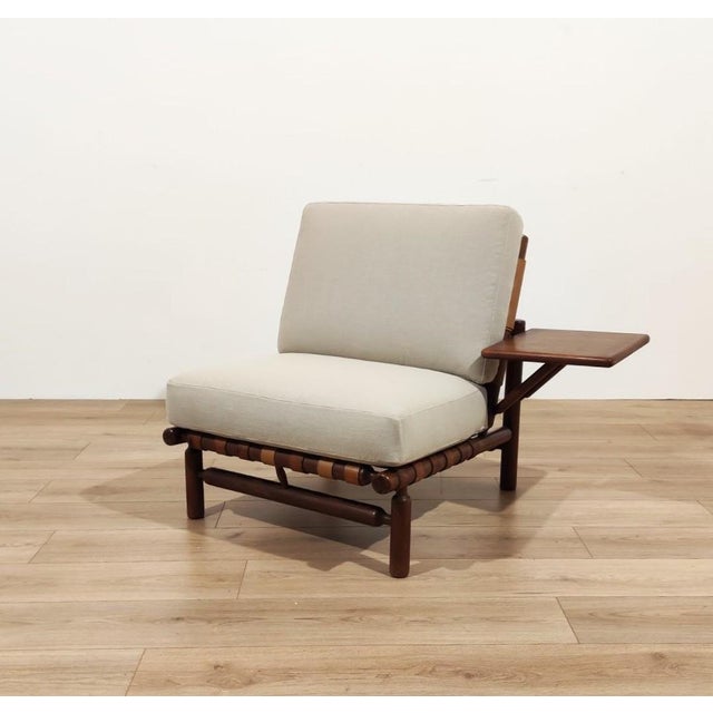 IT57 armchair with coffee table and footrest, designed by Ilmari Tapiovaara (1914-1999), produced by Paolo Arnaboldi,...