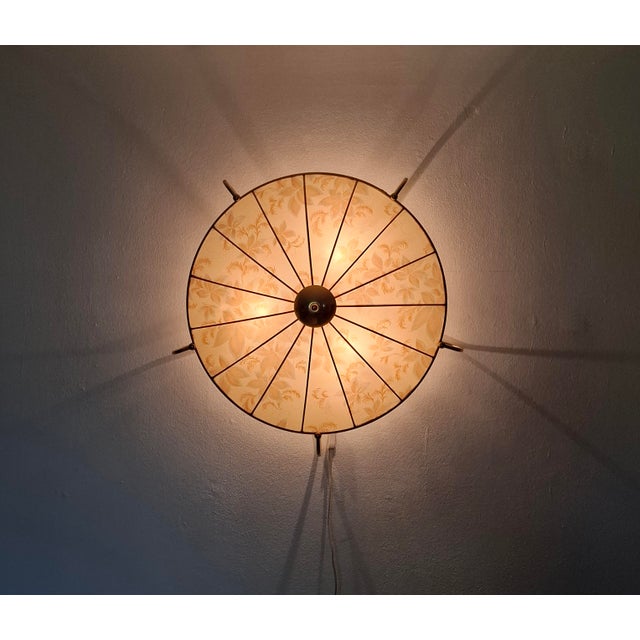 A very beautiful and elegant ceiling or wall light from erco lighting, model no. 70. made in germany in the 1950s. The...