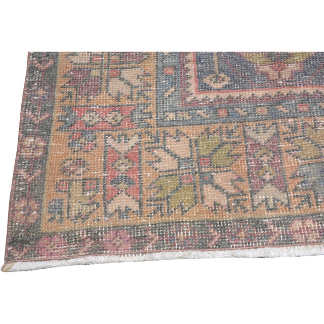 Hand-knotted with care using traditional rug-making techniques, this wool rug blends timeless craftsmanship with a modern...