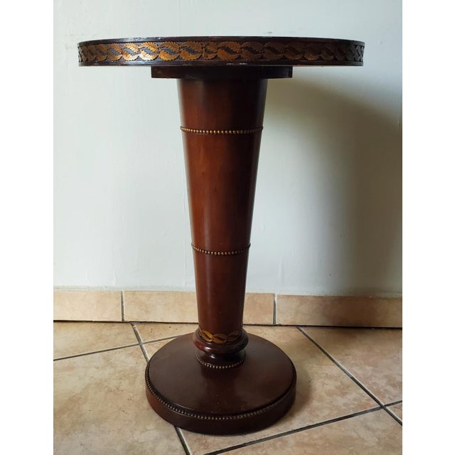 Gorgeous all wood vintage round accent table with gold leaf and 2 heavy rattan chairs. Fabulous as individual pieces or...