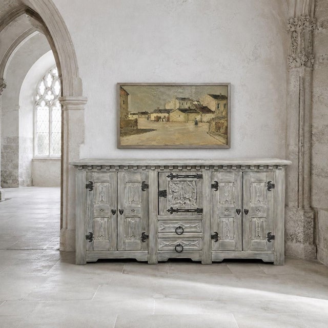 Grand French Normandy Gothic Revival White Oak Buffet was crafted on a remarkable scale from massive timbers and thick...