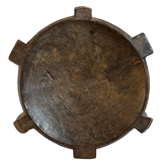 Vintage carved round wood three leg stool from the Hehe tribe of Tanzania. Concave bowl-like surface. Beautiful...