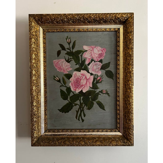 Antique oil painting on linen, circa 1890. Features pink roses on a grey background. In period ornate gold frame. No...