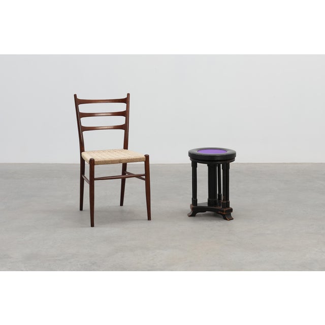 A rare and expressive Belgian Art Deco piano stool dating to around 1910, combining sculptural presence with functional...