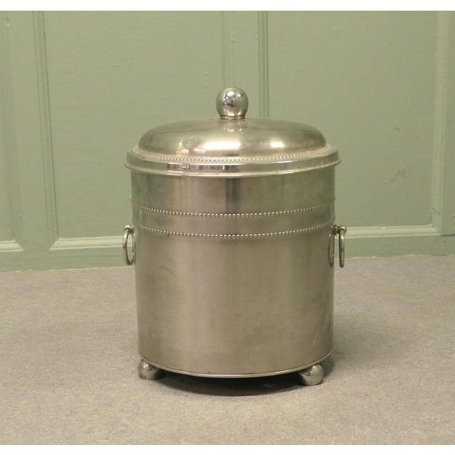 Art Deco Chrome Coal Bucket A classic design and a quality piece, the coal bucket stands on ball feet and has a ring...