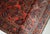 Handmade antique Sarouk rug in original good condition. The rug has been made in the beginning of 20th century in red...