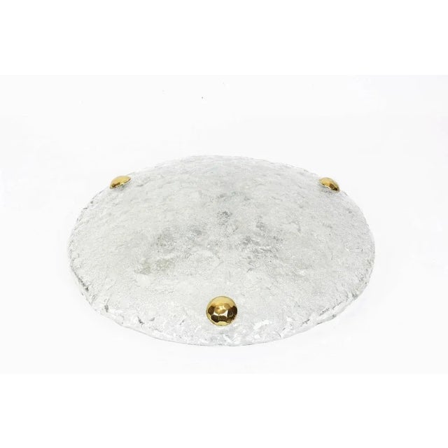 A wonderful round ice glass flushmount by hillebrand leuchten, germany, 1970s. Thick textured murano ice glass fixture on...