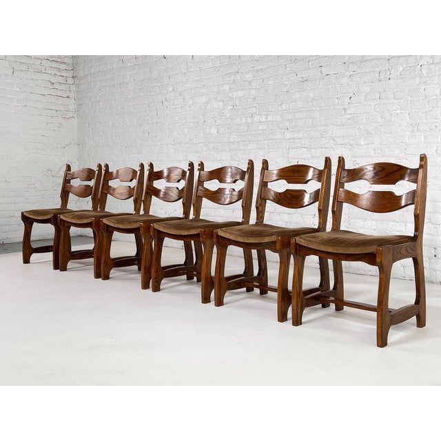 Magnificent and unusual set of 6 chairs 1950s Guillerme et Chambron attribute design in oak wooden structure and velvet...