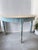 Absolutely stunning antique pair of demilune tables just in from France. Desirable aged patina of French blue and gray...