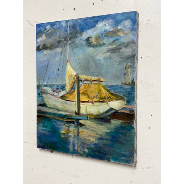 Design Plus Gallery presents a Circa 1983 Docked Sail Boat Painting by artist B. Bergman.. Acrylic on canvas depicting a...