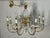 Vintage 8 light cut crystal and brass pineapple chandelier with brass canopy and sleeve caps. This elegant, bright...