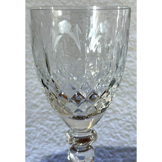 Elegant Rogaška Queen crystal water goblet featuring the ornate cut and engraved decoration associated with this...