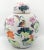 Offering a gorgeous vintage Chinese white porcelain ginger jar covered in traditional Chinese symbols, circa Mid 20th...