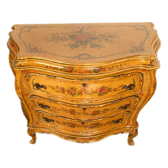 A fine antique hand-painted Italian Rococo bombe shaped three drawer commode, Venice, circa 1820. This very finely antique...