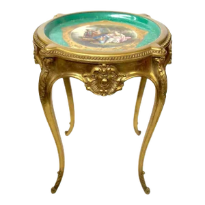 Early 1900s French Hand-Carved Table With Porcelain Plaque & Gold Finish