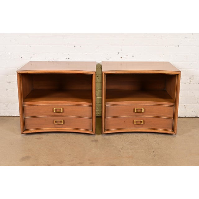 An exceptional pair of Mid-Century Modern nightstands By Paul Frankl for Johnson Furniture USA, Circa 1950s Sculpted...