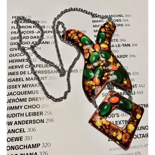 Chic statement necklace...dimensional glass enamel on copper...beautiful combination of green, orange, yellow, gold and...