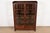 A beautiful antique Mission or Arts & Crafts period bookcase cabinet or display cabinet In the manner of Charles P....