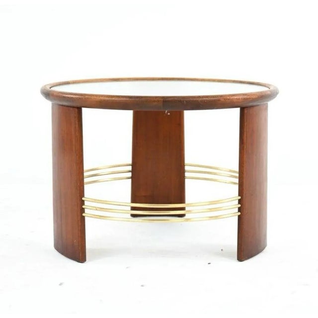 This exceptional and rare cocktail or side table is an instant statement piece. Expertly constructed of stained beechwood,...