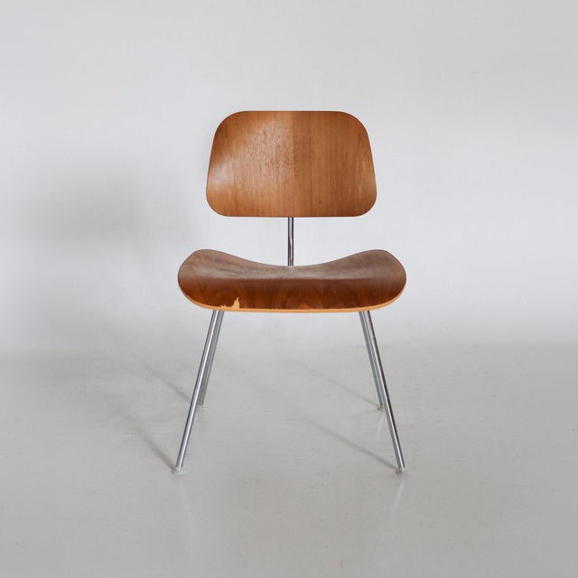 The DCM (Dining Chair Metal) is a masterpiece of 20th-century furniture design, born from Charles and Ray...