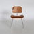 The DCM (Dining Chair Metal) is a masterpiece of 20th-century furniture design, born from Charles and Ray...