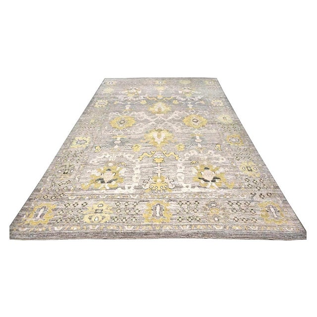 Condition: New Origin: Turkey Design: Oushak Actual size: 9' 2" X 13' 8" Thickness: 1/8" - 1/4" Colors: Gold, Ivory, Gray,...